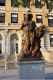 Carry On Dickinson
The  sculpture  depicts  the  Alma Mater,  personified  by  a  woman  in  flowing  robes,  urging  on  two doughboys,  one of  whom  is  dying.  The sculpture is set atop an inscribed base.